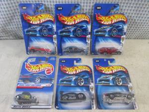 lot 209 image: (EC1) Assorted Hot Wheels in Packag...