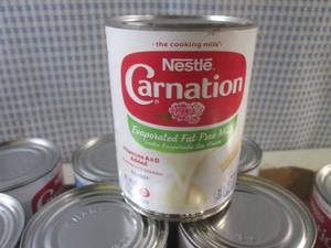 lot 248 image: (C-2) 12 Cans of Nestle Carnation E...