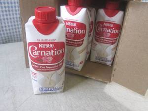 lot 255 image: (B-1) 8 Containers of Nestle Carnat...