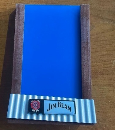 lot 1189 image: Jim Beam table top menu holder