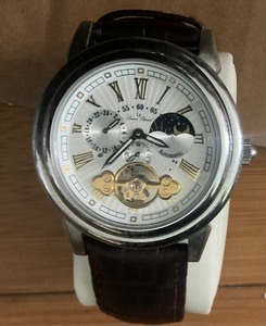 lot 1-314 image: Silver Lucien Piccard Automatic 2 Eye Watch ,  White dial