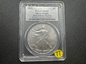 lot 77 image: 2015 1 Oz. American Silver Eagle Special Holiday Season Issue PCGS MS69  PCGS Price Guide $67