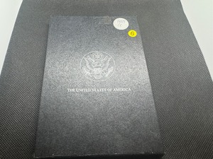 lot 6 image: GSA Uncirculated 1884 Carson City Morgan Dollar with Original Box and COA