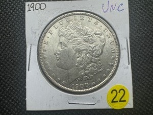 lot 22 image: 1900 Morgan Silver Dollar Marked UNC When Purchased