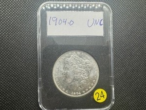 lot 24 image: 1904-O Morgan Silver Dollar Marked UNC When Purchased