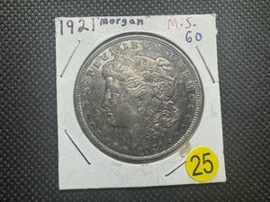 lot 25 image: 1921 Morgan Silver Dollar Marked MS60 When Purchased