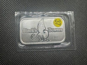 lot 37 image: 2023 BU Stacks & Bowers 1 Oz. Silver Bar