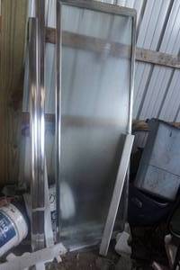 lot 11 image: Kohler Brand Glass Shower Door
