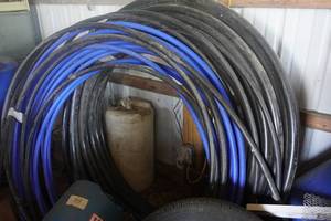 lot 12 image: Large Lot of Poly Water Line Pipe In Assorted Sizes