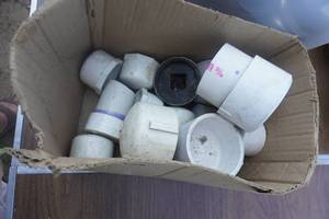 lot 57 image: Large Lot of PVC Caps