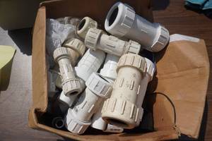 lot 114 image: Lot of PVC SprinklerWater Line Couplers and Repair Kits