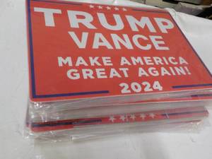 lot 192 image: 16 Trump Signs...