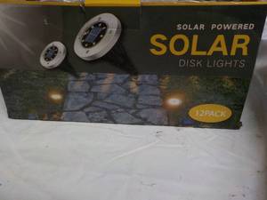 lot 225 image: Solar Disk Lights...