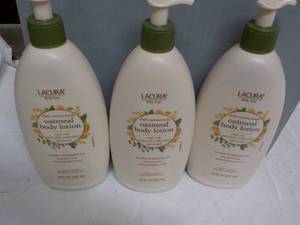 lot 261 image: 3 Lacura 18 oz Oatmeal Body Lotion...