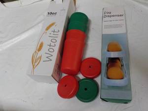 lot 338 image: Egg Dispenser and 10 oz Wotolit Whe...