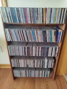 lot 90 image: Wood CD Storage Tower Filled with CDs