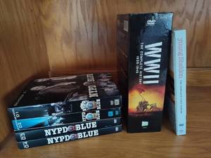 lot 62 image: DVDs WWII Complete Histor, NYPD Blue and Young Sheldon First Season