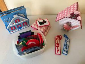 lot 148 image: Lot of Plastic Needlepoint Decor, Napkin Holder, Bird House and more.