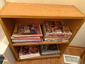 lot 193 image: Two-Shelf Book Shelf and Reminisce, Taste of Home & Country Woman Magazines
