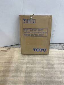 lot 15 image: TOTO - Elongated SoftClose Toilet Seat in Cotton White