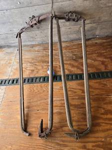 lot 9 image: Lot of 2 Vintage Cow Stanchions