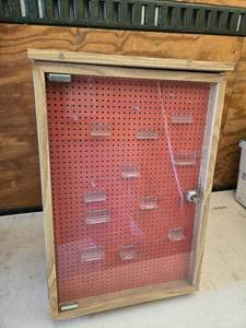 lot 15 image: Wooden Display Case with Pegboard and Lock Approx. base Width 16 12, Depth 12 and Height 25