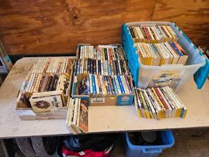 lot 21 image: Huge Lot of Louis LAmour Books