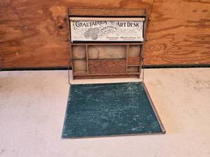 lot 27 image: Chautauqua Industrial Art Desk with rolling charts for educational purposes, including alphabets, numbers, music notes, and illustrations