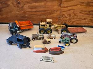 lot 46 image: Lot of Vintage Toy Vehicles and Parts including ERTL Transtar Dump Truck, Grader, Lumar and More