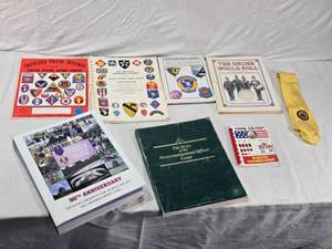 lot 69 image: Military Books and Memorabilia Lot including American Legion Yellow Tie, Shoulder Patch Insignia Book, and Marine Uniform Guide