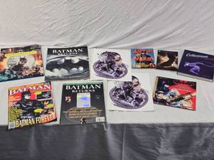 lot 83 image: Batman Themed Books and Magazines Collection including Batman Returns Official Movie Book, Batman Forever Magazine, and Catwoman Special Edition
