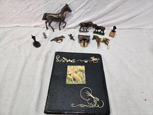 lot 96 image: Horse Figures and Scrapbook Collection including Figurines and Vintage Horse Scrapbook that Includes a Rider Profile