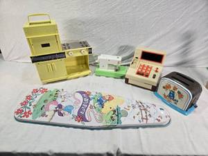 lot 104 image: Kenner Easy-Bake Oven, Ideal Cash Register, Little Gem Sewing Machine, Toaster, and Childrens Ironing Board