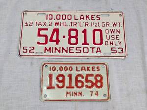 lot 128 image: Vintage Minnesota License Plates Set including 1952-53 and 1974
