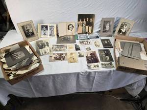 lot 180 image: Large Lot of Vintage Black and White Photographs featuring family portraits, outdoor scenes, weddings, and group photos from different eras