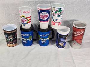 lot 215 image: Vintage Minnesota Sports - Twins, Twins World Series, Wild, Gophers - and Minnesota Lottery Cups Set