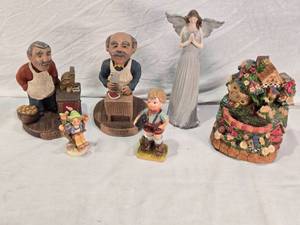 lot 216 image: Ceramic Figurines Including Soupbone Malone, a butcher with a cleaver and meat on the block, and A Country Store Keeper
