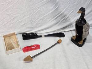 lot 227 image: Lot of Vintage Grooming Items Including Wooden Goose Shoe Brush, Shoe Horn, and Hair Combs