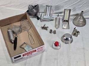 lot 235 image: Vintage Kitchenware and Cooking Tools including Sterling Silver Shakers, Dazey Super-Juicer, Vaughans Safety Roll Jr. Can Opener