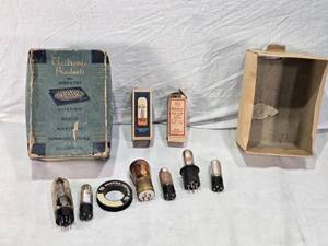 lot 246 image: Electronic Products Box with Vintage Vacuum Tubes and NEMA Worm Capsules Tool