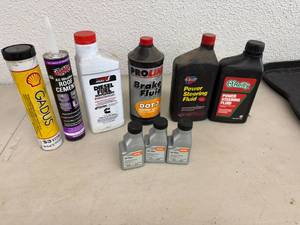 lot 96 image: Assortment of Full Oil Bottles, Grease
