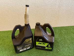 lot 106 image: Artic Cat 4 Cycle Oil