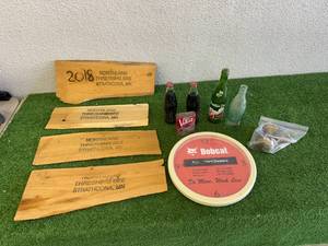 lot 162 image: Mixed Collectibles - Bobcat Clock, Soda Bottles, Velvet Tin