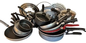 lot 50 image: Large Assorted Cookware Lot with Pots, Pans, and Lids