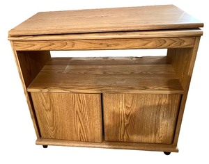 lot 65 image: Wooden Rolling TV Stand with Cabinet Doors