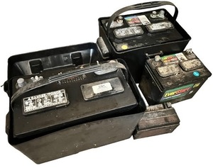 lot 112 image: Group of Used Automotive Batteries with Battery Boxes
