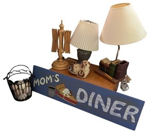 lot 132 image: Assorted Home Decor Lot with Lamps, Books, and Moms Diner Sign