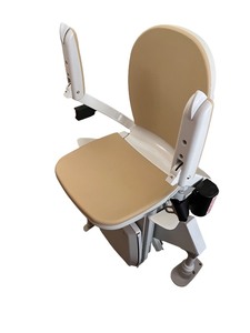 lot 13A image: Acorn 180 Curved Stairlift with Beige Seat and Manuals