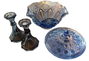 lot 229 image: Blue Pressed Glass Collection with Bowl, Covered Dish, and Candlestick Holders