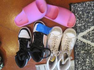 lot 68 image: Girls Puma and Nike high tops plus ...